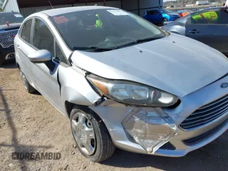 2016 Ford Fiesta S z VIN 3FADP4AJ2GM138776, wystawiony jako IAAI lot #41879870 z przebiegiem 83 769 mil mil oraz . Historia ofert i sprzedaży dostępna na DreamBid. Obrazek 6.
