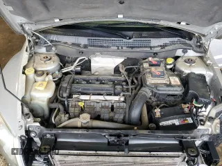 2011 Dodge Caliber Mainstreet z VIN 1B3CB3HAXBD237629, wystawiony jako Copart lot #56727465 z przebiegiem 155 166 mil mil oraz Szkoda całkowita • Salvage title. Historia ofert i sprzedaży dostępna na DreamBid. Obrazek 11.