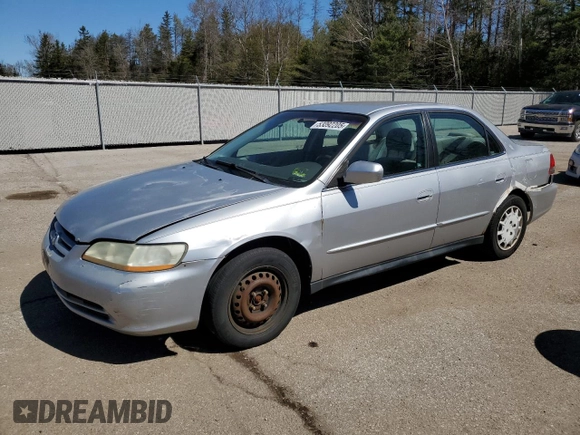 2002 Honda Accord LX z VIN 1HGCG56402A160961, wystawiony jako Copart lot #53092205 z przebiegiem 262 152 mil mil oraz Czysty tytuł • Clean title. Historia ofert i sprzedaży dostępna na DreamBid. Obrazek 1.