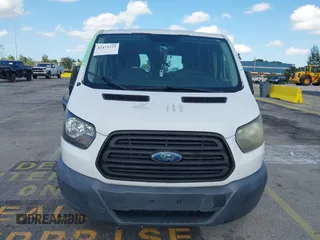 2015 Ford Transit Cargo with VIN 1FTYR1ZM3FKA82081, listed as a IAAI auction lot 42475225 with 255,716 mi miles and . Bid and sale history available at DreamBid. Image 12.