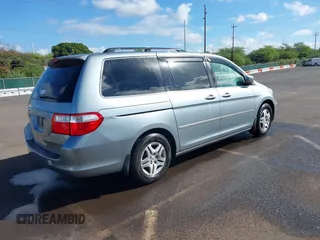 2007 Honda Odyssey EX-L with VIN 5FNRL38677B021464, listed as a IAAI auction lot 41568582 with 131,359 mi miles and . Bid and sale history available at DreamBid. Image 4.