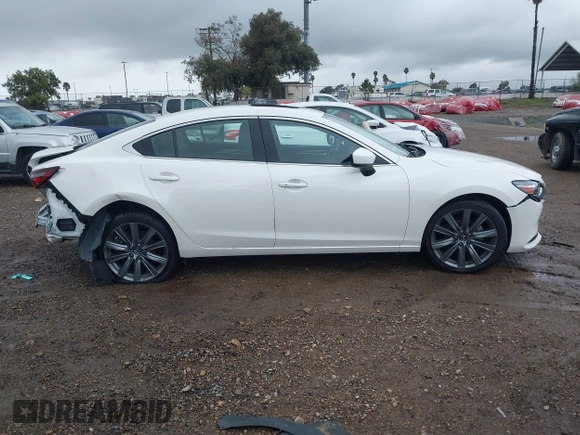 2021 Mazda 6 Touring with VIN JM1GL1VM7M1611070, listed as a IAAI auction lot 41755673 with 46,288 mi miles and . Bid and sale history available at carsss.com. Image 13.