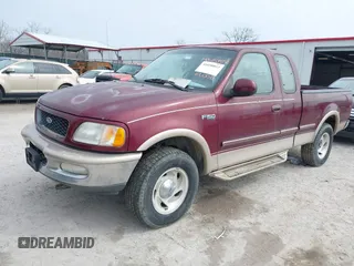 1997 Ford F-150 XL with VIN 1FTEX18L5VNC45344, listed as a IAAI auction lot 41690852 with 205,766 mi miles. Bid and sale history available at carsss.com. Image 2.