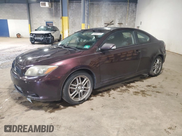 2008 Scion tC Spec with VIN JTKDE167580265188, listed as a Copart auction lot 65693115 with 156,502 mi miles and Salvage title. Bid and sale history available at DreamBid. Image 1.
