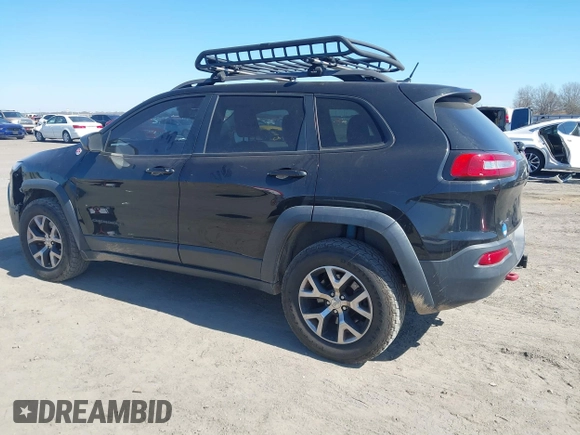 2015 Jeep Cherokee Trailhawk with VIN 1C4PJMBS5FW577470, listed as a IAAI auction lot 41565837 with 191,105 mi miles. Bid and sale history available at carsss.com. Image 14.