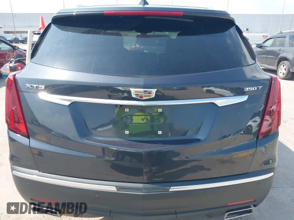 2023 Cadillac XT5 FWD Luxury с VIN 1GYKNAR40PZ193854, выставлен на аукционе IAAI как лот 42422246 с пробегом 26 053 миль миль и . История ставок и продаж доступна на DreamBid. Изображение 17.