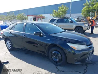 2015 Toyota Camry Hybrid LE with VIN 4T1BD1FK0FU153311, listed as a IAAI auction lot 40847865 with 417,133 mi miles. Bid and sale history available at carsss.com. Image 1.