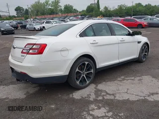2014 Ford Taurus SHO with VIN 1FAHP2KT9EG107862, listed as a IAAI auction lot 42266313 with Not provided miles and . Bid and sale history available at DreamBid. Image 4.