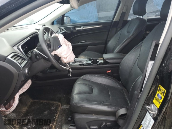 2016 Ford Fusion Titanium Hybrid z VIN 3FA6P0RU6GR139495, wystawiony jako Copart lot #52381235 z przebiegiem 138 534 mil mil oraz Czysty tytuł • Clean title. Historia ofert i sprzedaży dostępna na DreamBid. Obrazek 7.