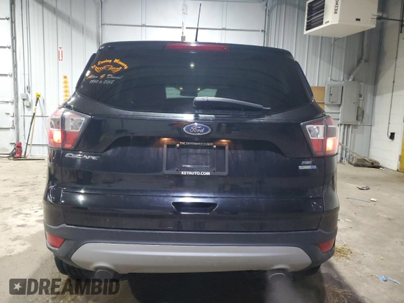 2017 Ford Escape SE with VIN 1FMCU9G99HUB08546, listed as a Copart auction lot 46652055 with 92,099 mi miles and Salvage Title. Bid and sale history available at DreamBid. Image 6.