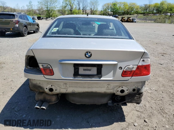 2000 BMW 3 Series 323Ci with VIN WBABM3345YJN83679, listed as a Copart auction lot 54029145 with 165,327 mi miles and Salvage Title. Bid and sale history available at DreamBid. Image 6.