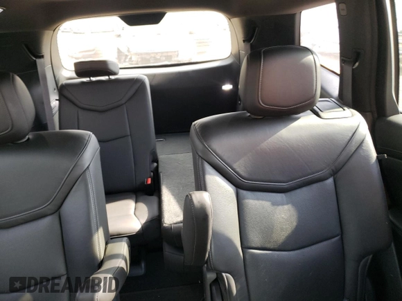 2020 Cadillac XT6 FWD Premium Luxury with VIN 1GYKPCRS6LZ102682, listed as a Copart auction lot 56906645 with 76,884 mi miles and Salvage title. Bid and sale history available at DreamBid. Image 10.