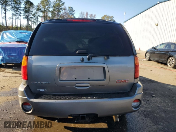 2009 GMC Envoy SLE with VIN 1GKDS33SX92131159, listed as a Copart auction lot 82487404 with 224,391 mi miles and Salvage Title. Bid and sale history available at carsss.com. Image 6.