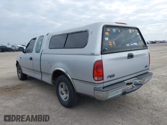 1999 Ford F-150 with VIN 1FTZX1720XKA10512, listed as a IAAI auction lot 41247083 with 169,154 mi miles and . Bid and sale history available at DreamBid. Image 3.