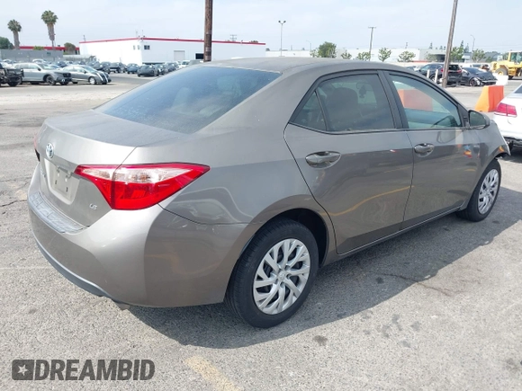 2018 Toyota Corolla L with VIN 5YFBURHE6JP774827, listed as a IAAI auction lot 42598086 with 29,400 mi miles and . Bid and sale history available at DreamBid. Image 4.