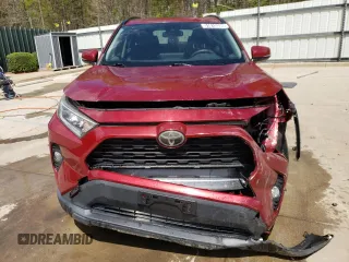 2019 Toyota RAV4 XLE with VIN JTMW1RFV0KD504459, listed as a Copart auction lot 51815305 with 129,826 mi miles and Clean Title. Bid and sale history available at carsss.com. Image 5.
