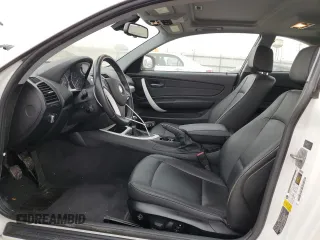 2012 BMW 1 Series 128i with VIN WBAUP7C55CVM54987, listed as a Copart auction lot 76133874 with 124,958 mi miles and Salvage title. Bid and sale history available at DreamBid. Image 7.