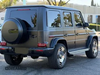 2021 Mercedes-Benz G 63 AMG with VIN W1NYC7HJXMX397464, listed as a Copart auction lot 76418314 with 19,811 mi miles and Salvage Title. Bid and sale history available at DreamBid. Image 4.