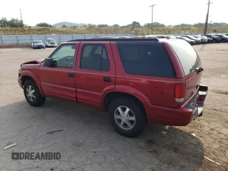 2000 Oldsmobile Bravada z VIN 1GHDT13W6Y2308007, wystawiony jako Copart lot #63862394 z przebiegiem 142 617 mil mil oraz Szkody całkowita. Historia ofert i sprzedaży dostępna na DreamBid. Obrazek 2.
