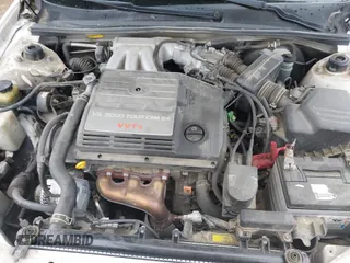 2000 Toyota Avalon XL z VIN 4T1BF28B9YU040456, wystawiony jako IAAI lot #42310333 z przebiegiem 201 596 mil mil oraz . Historia ofert i sprzedaży dostępna na DreamBid. Obrazek 10.