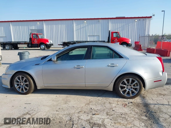 2009 Cadillac CTS RWD with VIN 1G6DV57V590125951, listed as a IAAI auction lot 42005788 with 160,133 mi miles and . Bid and sale history available at carsss.com. Image 14.