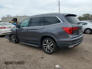 2017 Honda Pilot Touring with VIN 5FNYF5H97HB039702, listed as a Copart auction lot 54046145 with 149,050 mi miles and Salvage Title. Bid and sale history available at carsss.com. Image 2.