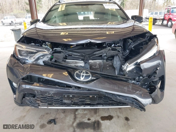 2018 Toyota RAV4 SE with VIN JTMJFREV4JJ742585, listed as a IAAI auction lot 41812675 with 51,672 mi miles. Bid and sale history available at carsss.com. Image 6.
