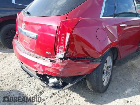 2015 Cadillac SRX z VIN 3GYFNAE3XFS572970, wystawiony jako IAAI lot #40854902 z przebiegiem 124 779 mil mil oraz . Historia ofert i sprzedaży dostępna na DreamBid. Obrazek 16.