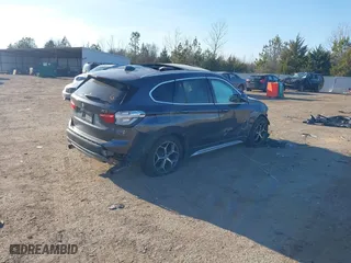 2018 BMW X1 xDrive28i with VIN WBXHT3C37J5K23855, listed as a IAAI auction lot 41442191 with 1 mi miles. Bid and sale history available at carsss.com. Image 4.