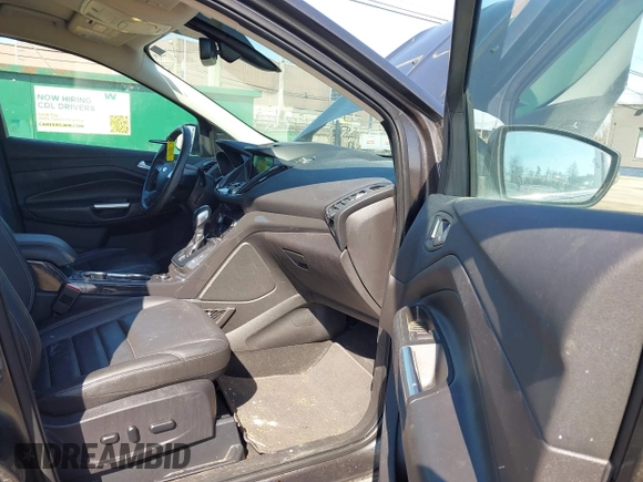 2016 Ford Escape Titanium with VIN 1FMCU9JX5GUA65412, listed as a IAAI auction lot 41859123 with 80,208 mi miles and . Bid and sale history available at DreamBid. Image 5.