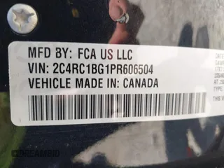 2023 Chrysler Pacifica Touring L with VIN 2C4RC1BG1PR606504, listed as a IAAI auction lot 42647652 with 41,598 mi miles and . Bid and sale history available at DreamBid. Image 9.