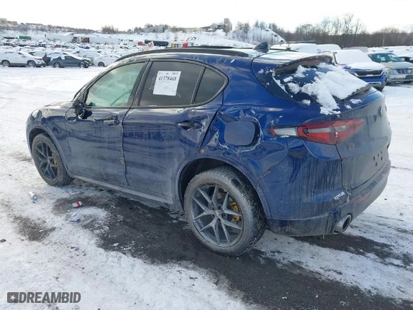 2021 Alfa Romeo Stelvio Ti with VIN ZASPAKBN1M7D09433, listed as a IAAI auction lot 41378468 with 31,717 mi miles. Bid and sale history available at carsss.com. Image 3.