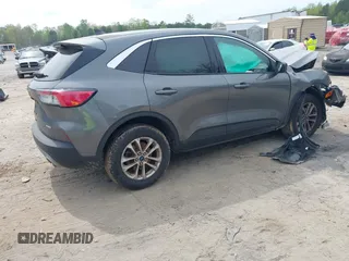 2022 Ford Escape SE with VIN 1FMCU9G64NUB95256, listed as a IAAI auction lot 42010127 with 32,009 mi miles and . Bid and sale history available at DreamBid. Image 4.