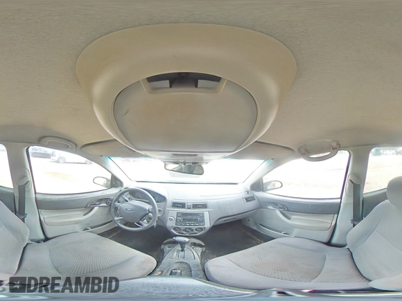 2006 Ford Focus S with VIN 1FAHP37N76W180039, listed as a Copart auction lot 58328565 with 220,696 mi miles and Salvage title. Bid and sale history available at DreamBid. Image 13.