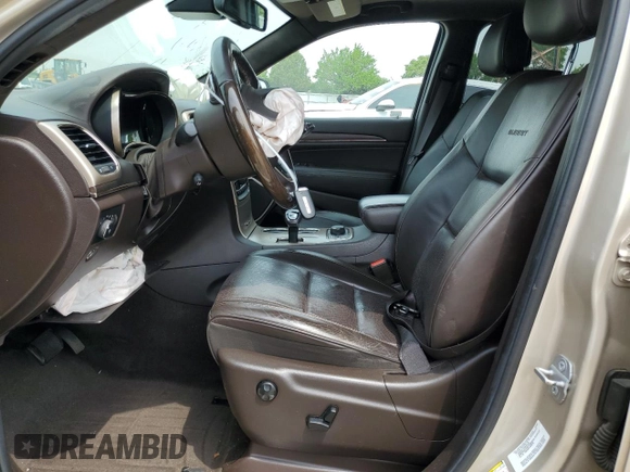 2014 Jeep Grand Cherokee Summit с VIN 1C4RJFJGXEC436797, выставлен на аукционе Copart как лот 60248595 с пробегом 156 395 миль миль и Списание • Salvage title. История ставок и продаж доступна на DreamBid. Изображение 7.