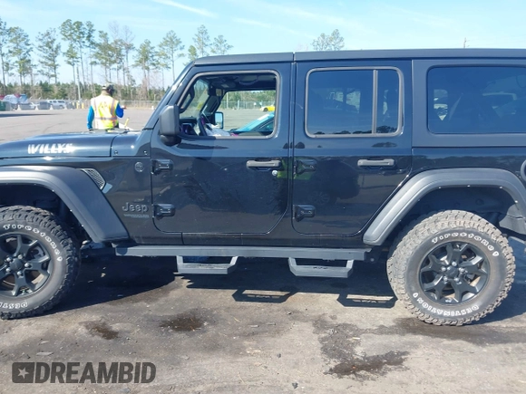 2021 Jeep Wrangler Unlimited Sport S with VIN 1C4HJXDN6MW812565, listed as a IAAI auction lot 41506140 with 27,273 mi miles and . Bid and sale history available at DreamBid. Image 14.