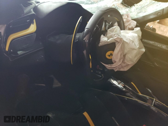 2023 Ferrari SF90 z VIN ZFF95NLA8P0299159, wystawiony jako Copart lot #52724044 z przebiegiem Nie podano mil oraz Szkody całkowita. Historia ofert i sprzedaży dostępna na DreamBid. Obrazek 8.