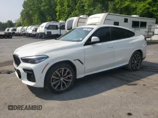 2022 BMW X6 xDrive40i z VIN 5UXCY6C03N9L02291, wystawiony jako Copart lot #59276225 z przebiegiem Nie podano mil oraz Szkoda całkowita • Salvage title. Historia ofert i sprzedaży dostępna na DreamBid. Obrazek 1.
