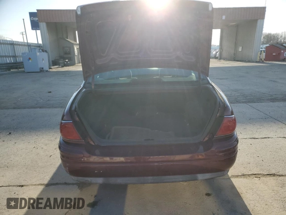 2000 Buick LeSabre Limited с VIN 1G4HR54KXYU124567, выставлен на аукционе Copart как лот 48954165 с пробегом 237 707 миль миль и Списание • Salvage title. История ставок и продаж доступна на DreamBid. Изображение 6.