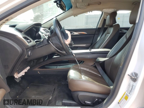 2014 Lincoln MKZ z VIN 3LN6L2G90ER820731, wystawiony jako Copart lot #57818185 z przebiegiem 133 133 mil mil oraz Szkoda całkowita • Salvage title. Historia ofert i sprzedaży dostępna na DreamBid. Obrazek 7.