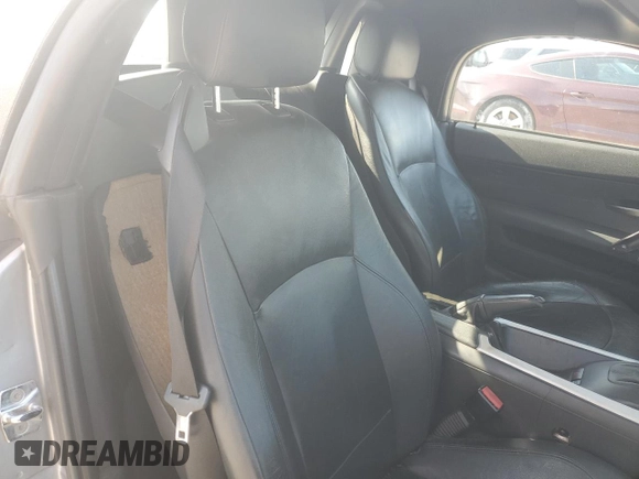 2006 BMW Z4 3.0si with VIN 4USBU53566LX00267, listed as a Copart auction lot 55820915 with 143,288 mi miles and Salvage title. Bid and sale history available at DreamBid. Image 10.
