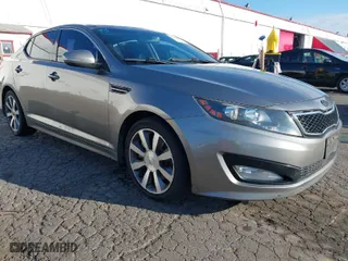 2013 Kia Optima SX w/Limited Pkg with VIN 5XXGR4A69DG190125, listed as a IAAI auction lot 41424498 with 134,056 mi miles. Bid and sale history available at carsss.com. Image 1.
