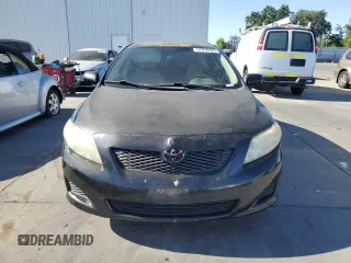 2010 Toyota Corolla with VIN 2T1BU4EE3AC348780, listed as a Copart auction lot 57978025 with 215,320 mi miles and Clean title. Bid and sale history available at DreamBid. Image 5.