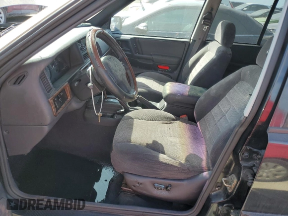 1998 Jeep Grand Cherokee Laredo with VIN 1J4GZ48Y7WC321234, listed as a Copart auction lot 75438624 with 0 mi miles and Salvage Title. Bid and sale history available at carsss.com. Image 7.