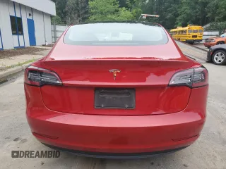 2023 Tesla Model 3 with VIN 5YJ3E1EA6PF437390, listed as a Copart auction lot 62825135 with 115,121 mi miles and Clean title. Bid and sale history available at DreamBid. Image 6.