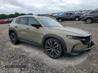 2023 Mazda CX-50 Premium Plus with VIN 7MMVABEY6PN113039, listed as a Copart auction lot 61629645 with 55,759 mi miles and Salvage title. Bid and sale history available at DreamBid. Image 4.