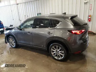 2021 Mazda CX-5 Grand Touring with VIN JM3KFBDM6M0478372, listed as a Copart auction lot 43797295 with 31,763 mi miles and Salvage Title. Bid and sale history available at carsss.com. Image 2.