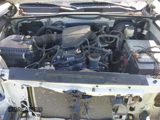2017 Toyota Tacoma SR z VIN 5TFRX5GN9HX093461, wystawiony jako IAAI lot #41892559 z przebiegiem 159 986 mil mil oraz . Historia ofert i sprzedaży dostępna na DreamBid. Obrazek 10.