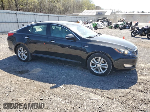 2013 Kia Optima EX z VIN 5XXGN4A71DG197381, wystawiony jako Copart lot #53619615 z przebiegiem 100 873 mil mil oraz Szkoda całkowita • Salvage title. Historia ofert i sprzedaży dostępna na DreamBid. Obrazek 4.
