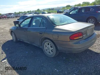 2001 Oldsmobile Intrigue GX z VIN 1G3WH52H11F148269, wystawiony jako IAAI lot #42238449 z przebiegiem Nie podano mil oraz . Historia ofert i sprzedaży dostępna na DreamBid. Obrazek 3.